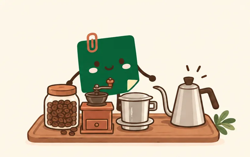 Mascot Daily Log Coffee sắp xếp nguyên liệu pha cà phê phin: hạt Robusta, máy xay, phin inox và ấm rót